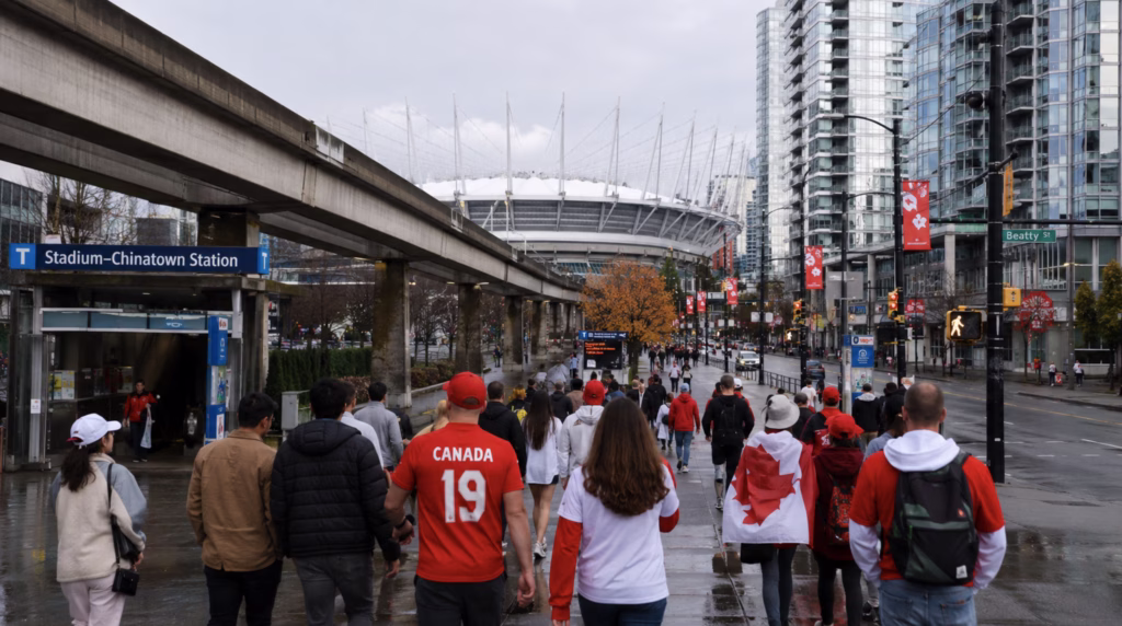 Soccer fans walking to BC Place for a World Cup match in Vancouver near stadium-chinatown train station