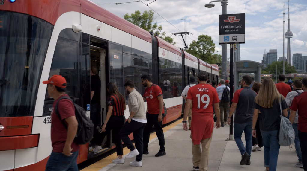Soccer fans using the eastbound exhibition loop transit to reach a World Cup match in Toronto